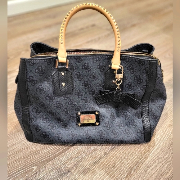 Guess Handbags - GUESS black and tan purse